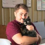 Adam Bridges photo with a cat